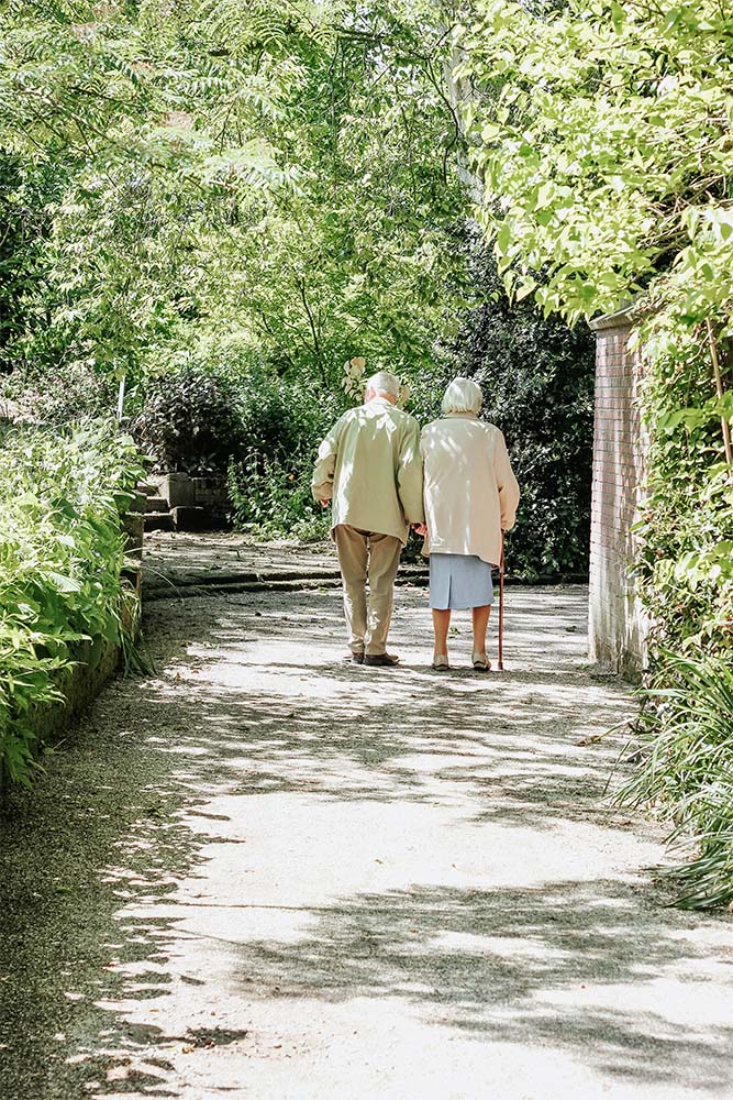 elderly couple out on a walk