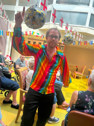 staff dancing at summer party